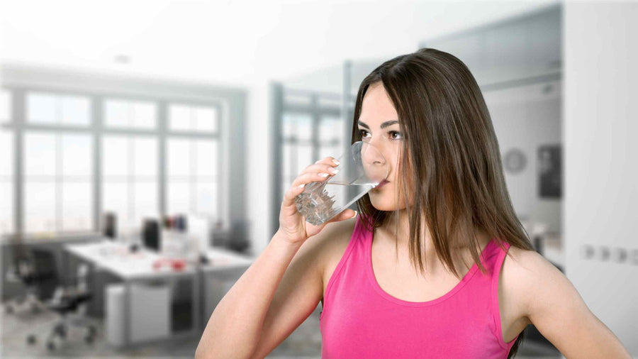 a-young-woman-enjoying-a-glass-of-filtered-water.jpg