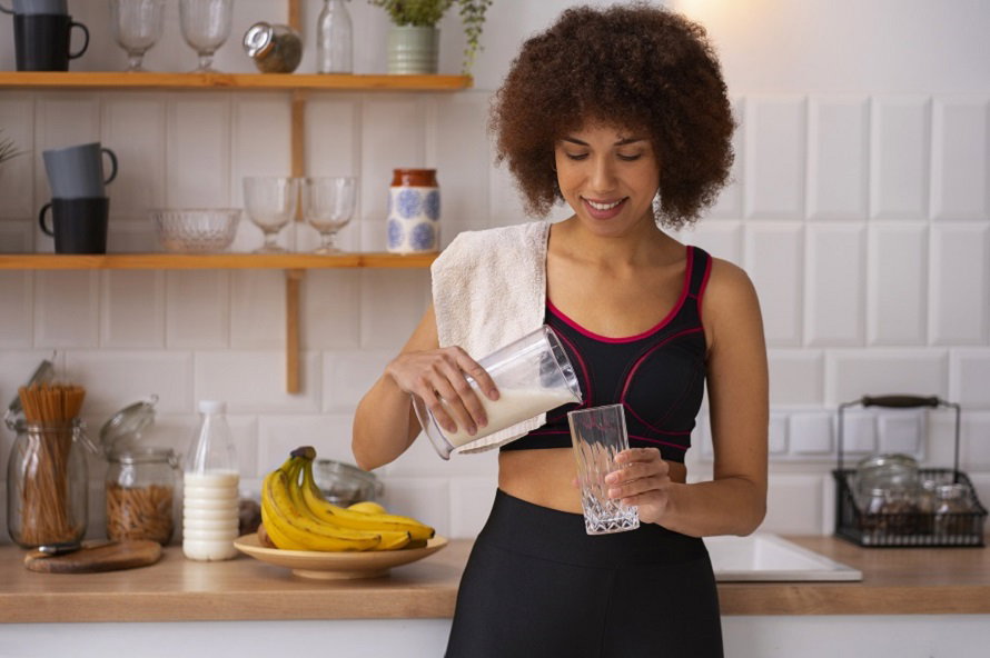 medium-shot-fit-woman-home.jpg
