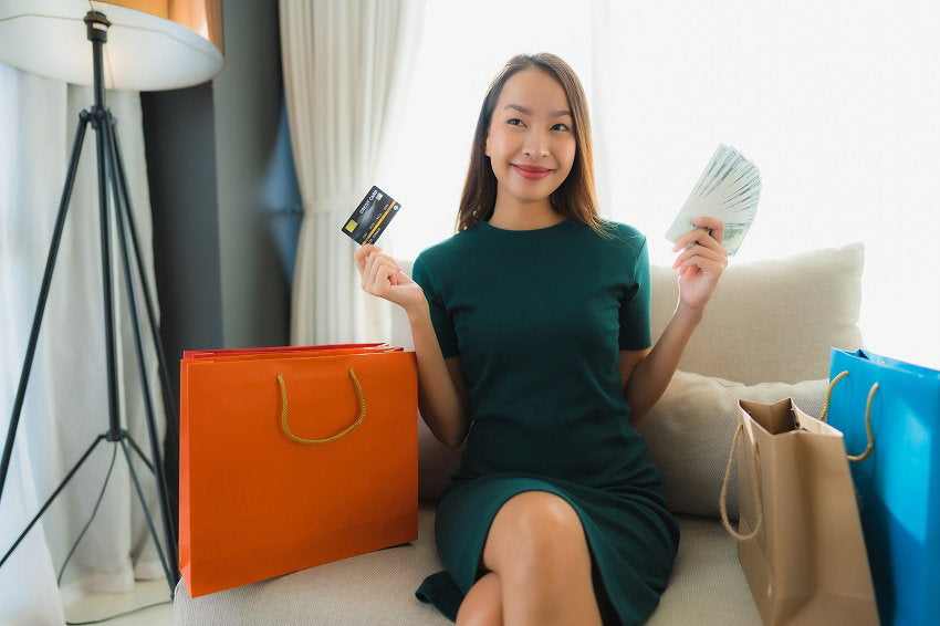 portrait-beautiful-young-asian-women-using-credit-card-online-shopping_(1).jpg