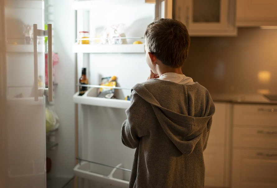 medium-shot-boy-looking-fridge.jpg