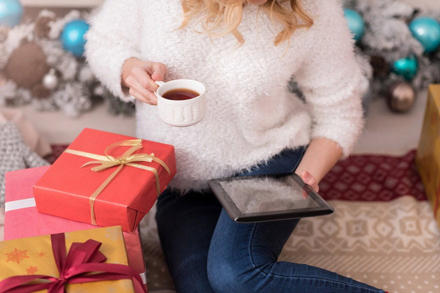 being-informed-nice-young-blond-woman-holding-tablet-having-tea-while-reading-news.jpg