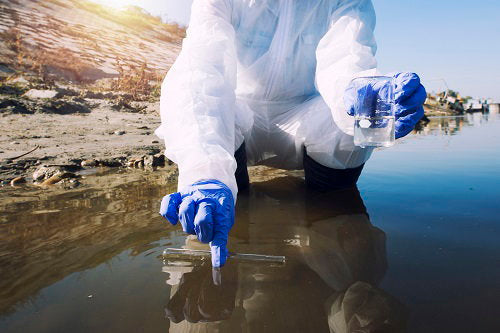 ecologist-taking-samples-water-with-test-tube-from-city-river-determine-level-contamination-pollution.jpg