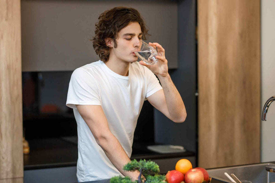 a-young-man-drinking-filtered-water.jpg