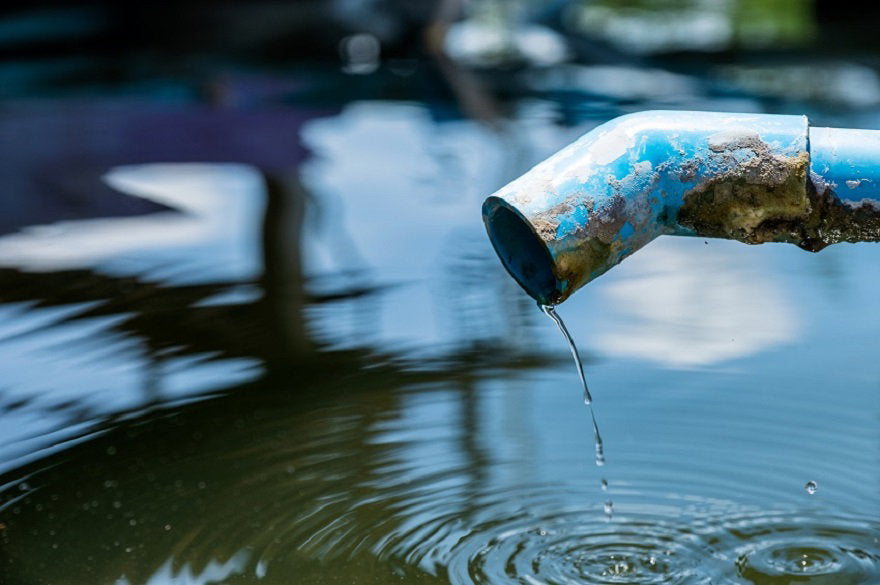 blue-pipe-water-drop-pond-with-ripple.jpg